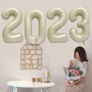 Detailed cream 2023 foil number balloons for New Year and anniversary party decorations