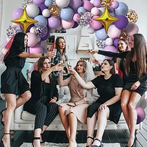 Unicorn party balloon arch kit with macaron rainbow colors and gold star balloons