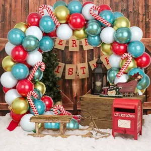 Christmas balloon arch kit with red green gold latex and candy cane foil balloons decor