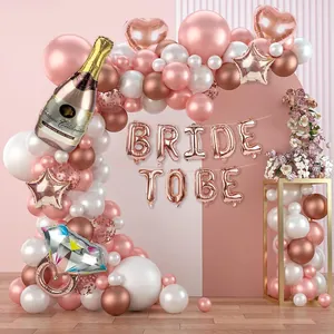 Rose gold bridal shower balloon arch kit with champagne and ring foil balloons