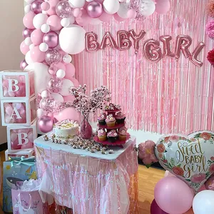 Detail of pink and white balloon garland kit with rose gold baby girl foil letters
