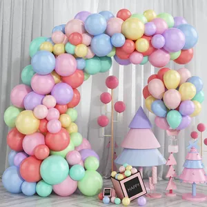 Detail of macaron pastel balloon arch kit with assorted sizes for birthday party decoration