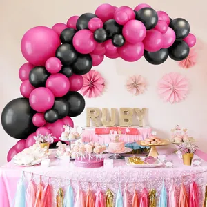 Balloon arch kit detail featuring hot pink and black latex balloons for party decor