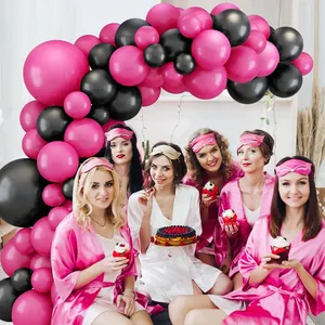 Hot pink and black balloon arch kit for birthday party decorations with latex balloons