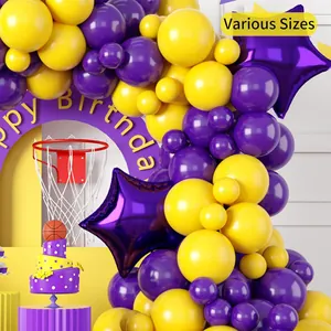 Detail view of yellow and purple balloon arch kit with star foil balloon for basketball party