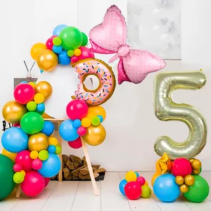 5th birthday balloon set with gold number 5, colorful donut and bow foil balloons