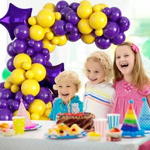 Yellow and purple balloon garland kit with star foil balloons for 5th birthday party decor