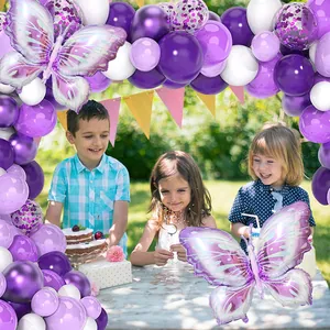 Purple balloon arch with large butterfly foil balloons for girls' outdoor birthday parties
