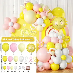 Macro detail of macaron daisy balloon garland kit with smiling sun foil balloons