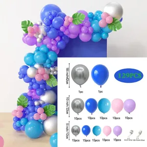 Blue and purple balloon arch kit with silver balloons and palm leaves for party decoration