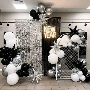 Modern black white and silver balloon arch kit with star foil balloons for New Year party