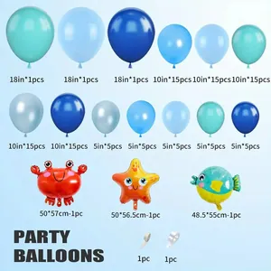 Blue ocean theme balloon arch kit with starfish, pufferfish, and crab foil balloons
