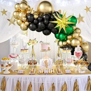 Metallic gold and dark green balloon arch kit with star foil balloons for birthday party
