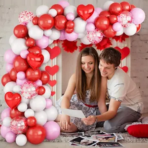 Detailed balloon arch kit with red heart foil balloons for romantic wedding decoration