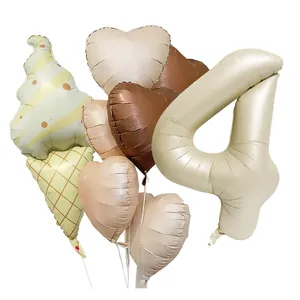 Balloon set detail with beige number 4, ice cream foil balloon and matte earth tone hearts