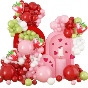 Strawberry theme party balloon garland kit with red pink and green latex balloons