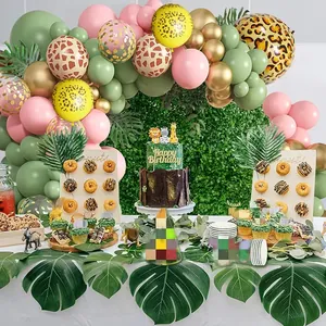 Kit fête jungle avec ballons léopard, verdure et décorations d'anniversaire