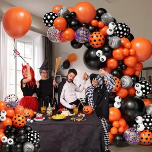 Halloween balloon arch kit with orange and black monster balloons for party decoration