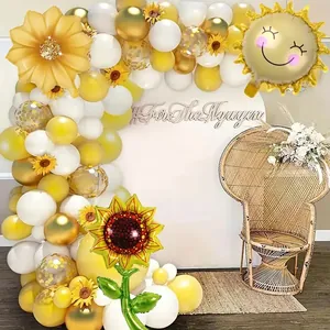 Cheerful sunflower balloon arch kit with bright yellow and gold latex balloons for parties