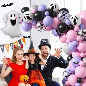 Detail of Halloween balloon arch with ghost foil balloon and purple pink latex balloons