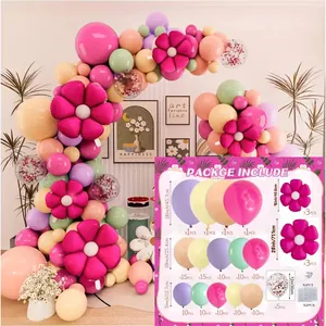 Colorful daisy balloon arch kit with pink flower foil balloons for birthday party decor