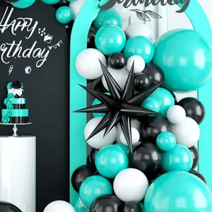 Detail of teal and black balloon arch kit with a 3D star foil balloon for party decor