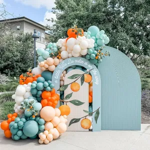 Macaron orange and blue balloon arch kit with artificial oranges for birthday party decor