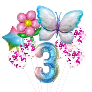 Detail of butterfly and number 3 balloon set with pink confetti latex balloons