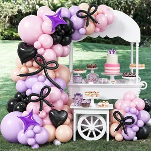 Pink and purple balloon arch kit with black bow and star balloons for wedding party