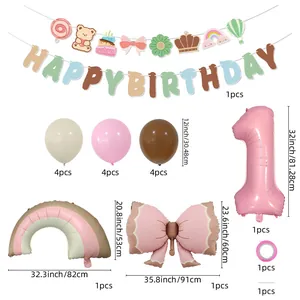 First birthday decoration set with matte bow and rainbow foil balloons and banner
