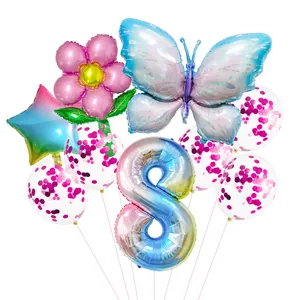 Detail of party balloon set including gradient number 8, butterfly and confetti balloons