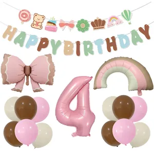 Detailed flat lay of matte bow foil balloon and Morandi birthday party decoration set