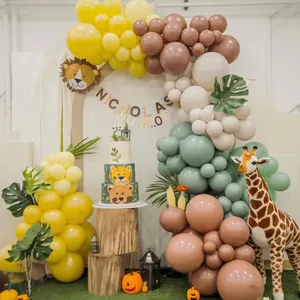Jungle theme balloon garland kit with animal accents and Nicholas Two birthday banner