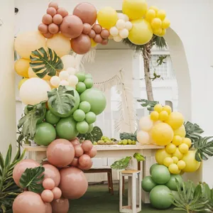 Jungle theme balloon arch kit with sage green and cream latex balloons for party decor