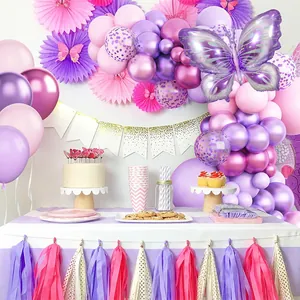 Purple butterfly balloon arch kit with paper fans and tassels for party decor