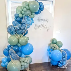 Ocean theme balloon garland kit with navy blue and sage green balloons for birthday party