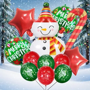 Detail of Christmas snowman foil balloon with candy cane and festive latex balloons