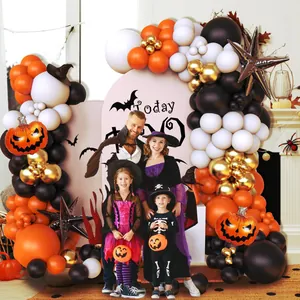 Halloween balloon arch kit with orange black and white latex balloons and pumpkin foil decor