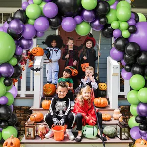 Halloween balloon arch kit featuring purple green and black latex balloons for party decor