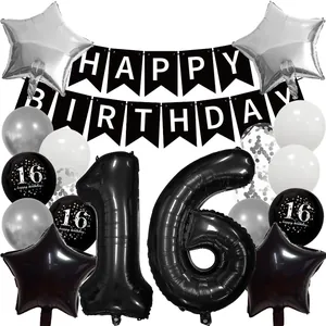 Black and gold 16th Happy Birthday party decorations with balloons and hanging banner