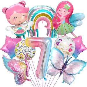 Dettaglio decorazioni compleanno fata con palloncini arcobaleno e farfalla