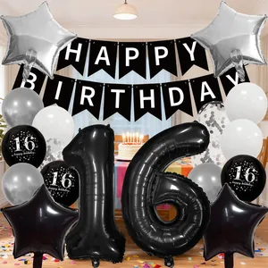 Detail of the 16th birthday party set with black and silver balloons and a banner