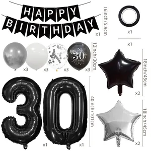 Detailed 30th birthday party set with black banners, silver stars and number 30 balloons