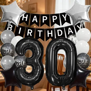 Detail view of the 30th birthday decoration set with black and silver balloons and banner