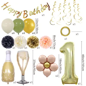 Birthday party set with champagne foil balloons, gold banners and assorted latex balloons