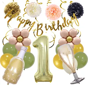 Detailed components of first birthday party set with champagne balloons and banners