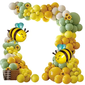 Bee and sunflower themed balloon arch kit with sage green and yellow latex balloons