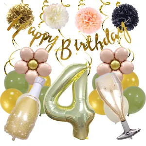 Detail of 4th birthday party set with gold number balloon and Happy Birthday banner