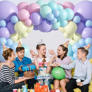 Detail of macaron balloon arch with lavender, pink, and blue colors for party decor
