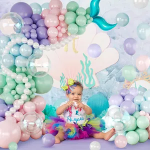 Mermaid theme girl first birthday outfit with custom tutu skirt and balloon arch backdrop